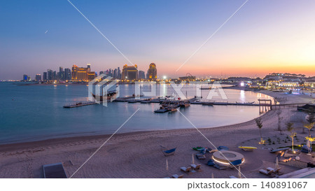 View from Katara Beach day to night timelapse in Doha, Qatar, towards the West Bay and city center View from Katara Beach day to night timelapse in Doha, Qatar, towards the West Bay and city center 140891067