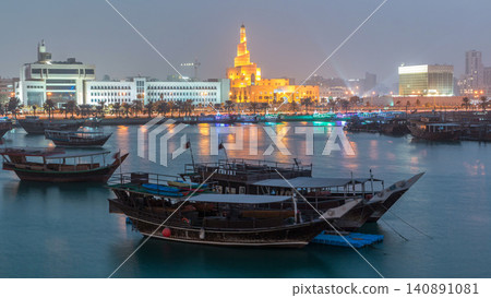 Evening at Doha Bay day to night timelapse with Traditional Wooden Dhow Fishing Boats. Evening at Doha Bay day to night timelapse with Traditional Wooden Dhow Fishing Boats. 140891081