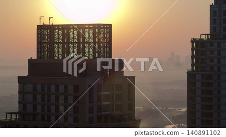 Sunrise in Dubai Marina with towers from skyscrapers rooftop, Dubai, UAE timelapse Sunrise in Dubai Marina with towers from skyscrapers rooftop, Dubai, UAE timelapse 140891102