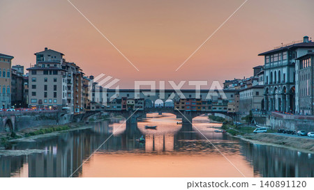 Sunset view of Florence Ponte Vecchio over Arno River in Florence timelapse, Italy. 140891120