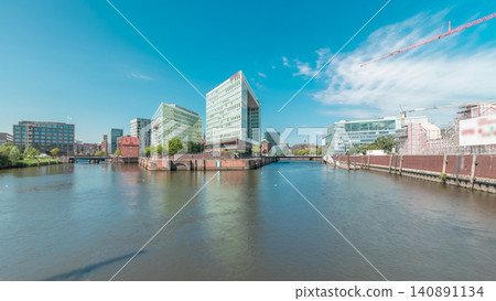 Panorama showing Hamburg HafenCity skyline timelapse at Ericusgraben with a view of modern Spiegel office buildings Panorama showing Hamburg HafenCity skyline timelapse at Ericusgraben with a view of modern Spiegel office buildings 140891134