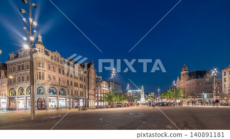The Dam square in Amsterdam day to night timelapse panorama, The Netherlands. The Dam square in Amsterdam day to night timelapse panorama, The Netherlands. 140891181
