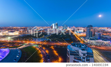 Elevated view over the city center and central business district day to night timelapse, Central Asia, Kazakhstan, Astana 140891194
