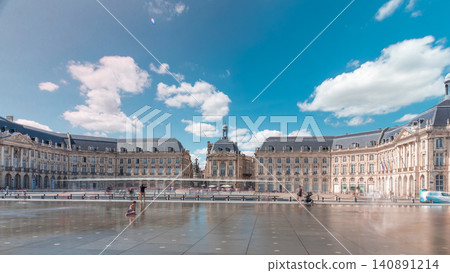 Place de la Bourse and Miroir d'eau timelapse hyperlapse in Bordeaux, France, reflecting historic architecture 140891214
