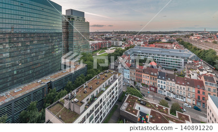 Aerial timelapse of Brussels urban landscape blending office skyscrapers with residential areas. Aerial timelapse of Brussels urban landscape blending office skyscrapers with residential areas. 140891220