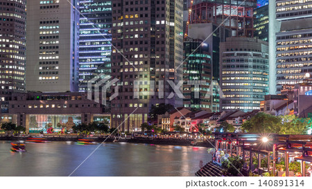 Singapore quay with tall skyscrapers in the central business district on Boat Quay day to night timelapse Singapore quay with tall skyscrapers in the central business district on Boat Quay day to night timelapse 140891314