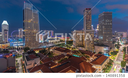 Evening panorama with Marina Bay area and skyscrapers city skyline aerial day to night timelapse. 140891358