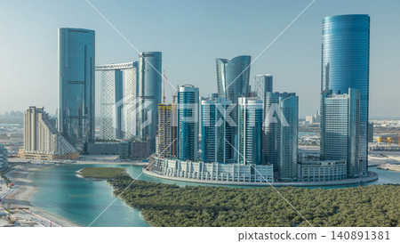 Buildings on Al Reem island in Abu Dhabi timelapse from above. Buildings on Al Reem island in Abu Dhabi timelapse from above. 140891381