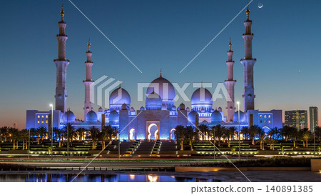 Sheikh Zayed Grand Mosque in Abu Dhabi day to night timelapse after sunset, UAE Sheikh Zayed Grand Mosque in Abu Dhabi day to night timelapse after sunset, UAE 140891385