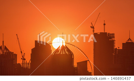 Dubai Marina skyscrapers from golf course sunset timelapse, Dubai, United Arab Emirates 140891437