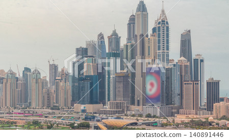 Dubai Marina skyscrapers and golf course morning timelapse, Dubai, United Arab Emirates Dubai Marina skyscrapers and golf course morning timelapse, Dubai, United Arab Emirates 140891446