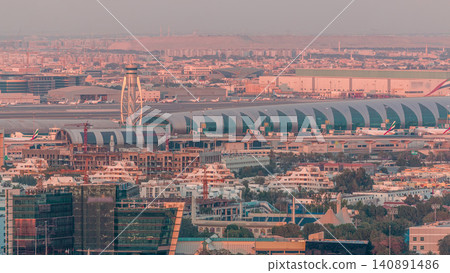 View of modern buildings in luxury Dubai city at sunset aerial timelapse View of modern buildings in luxury Dubai city at sunset aerial timelapse 140891486