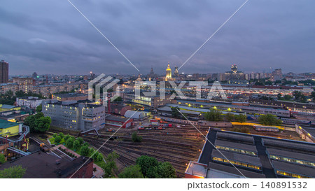 Evening top view of three railway stations day to night timelapse at the Komsomolskaya square in Moscow, Russia 140891532