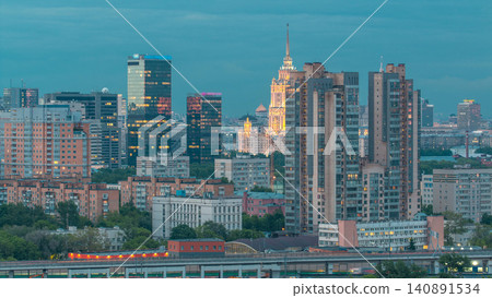 Aerial view to cityscape skyline with World Trade Center towers and hotel Ukraine day to night timelapse in Moscow, Russia. 140891534