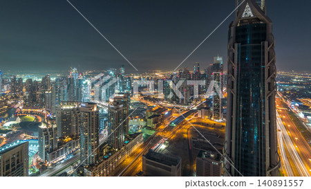 Dubai Downtown day to night timelapse modern towers panoramic view from the top in Dubai, United Arab Emirates. 140891557