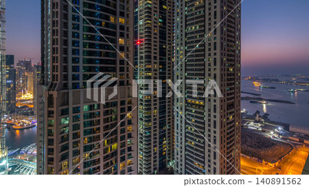 Dubai Marina day to night timelapse, Glittering lights and tallest skyscrapers Dubai Marina day to night timelapse, Glittering lights and tallest skyscrapers 140891562