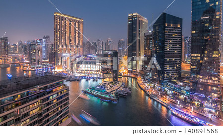 Beautiful aerial top view day to night transition timelapse of Dubai Marina canal Beautiful aerial top view day to night transition timelapse of Dubai Marina canal 140891568