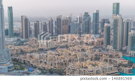 Dubai downtown night to day timelapse. Top view from above Dubai downtown night to day timelapse. Top view from above 140891569