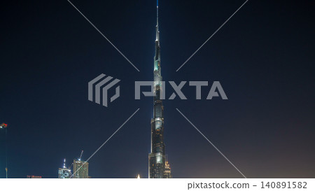 Dubai downtown cityscape with Burj Khalifa, LightUp light show aerial timelapse Dubai downtown cityscape with Burj Khalifa, LightUp light show aerial timelapse 140891582