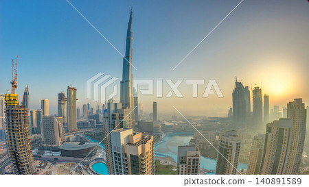 Foggy morning sunrise in downtown of Dubai timelapse. 140891589