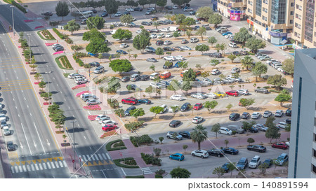 Top view of parking lot timelapse from rooftop of skyscraper Top view of parking lot timelapse from rooftop of skyscraper 140891594