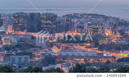 Panoramic view over Lisbon and Almada from a viewpoint in Monsanto night to day timelapse. Panoramic view over Lisbon and Almada from a viewpoint in Monsanto night to day timelapse. 140891609