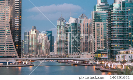 Dubai Marina towers and canal in Dubai day to night timelapse Dubai Marina towers and canal in Dubai day to night timelapse 140891661