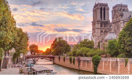 Sunset view of Cathedral Notre Dame de Paris timelapse in Paris, France. Sunset view of Cathedral Notre Dame de Paris timelapse in Paris, France. 140891699