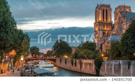 Cathedral Notre Dame de Paris day to night timelapse after sunset in Paris, France. Cathedral Notre Dame de Paris day to night timelapse after sunset in Paris, France. 140891700