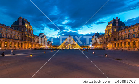 The Louvre museum pyramid after sunset day to night timelapse in Paris, France The Louvre museum pyramid after sunset day to night timelapse in Paris, France 140891708