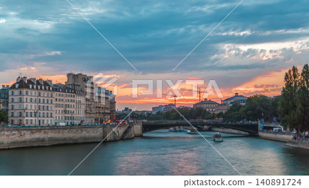 Le Pont D'Arcole bridge at sunset with people and boats timelapse, Paris, France, Europe Le Pont D'Arcole bridge at sunset with people and boats timelapse, Paris, France, Europe 140891724