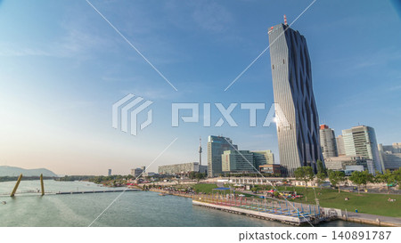 Donaustadt Danube City timelapse hyperlapse is a modern quarter with skyscrapers and business centres in Vienna, Austria. Donaustadt Danube City timelapse hyperlapse is a modern quarter with skyscrapers and business centres in Vienna, Austria. 140891787