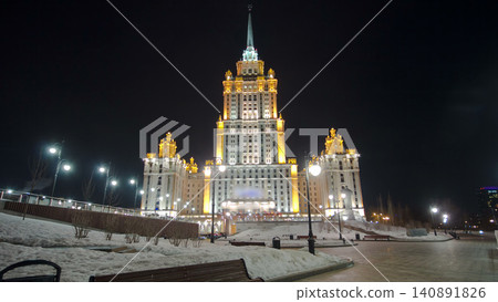 Hotel Ukraine winter night timelapse hyperlapse with bridge over Moscow River. Hotel Ukraine winter night timelapse hyperlapse with bridge over Moscow River. 140891826