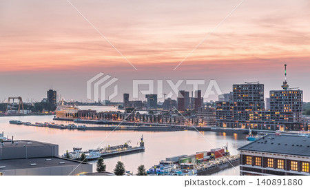 Panoramic aerial day to night timelapse of Katendrecht peninsula and Maashaven harbour in Rotterdam, The Netherlands. Panoramic aerial day to night timelapse of Katendrecht peninsula and Maashaven harbour in Rotterdam, The Netherlands. 140891880