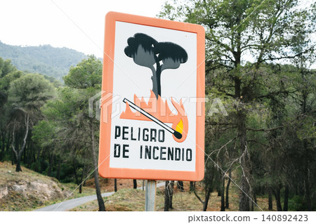 Warning sign for fire hazard alert in forest area with burning match symbol Warning sign for fire hazard alert in forest area with burning match symbol 140892423