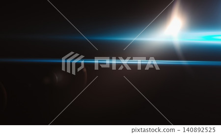 Abstract light streaks and lens flare against dark background Abstract light streaks and lens flare against dark background 140892525
