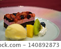 Fruitcake and ice cream 140892873