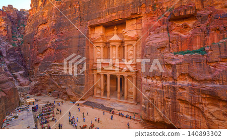 Petra, Wadi Musa, Jordan - Mar 06 2023, aerial view of Al-Khazneh tomb, symbol of the city of Petra, Wadi Musa, Jordan Petra, Wadi Musa, Jordan - Mar 06 2023, aerial view of Al-Khazneh tomb, symbol of the city of Petra, Wadi Musa, Jordan 140893302