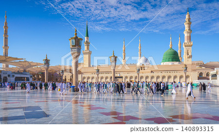 Al-Madinah al-Munawwarah, Saudi Arabia - Mar 09 2023, Pilgrims walk through the main mosque of the Prophet Muhammad Al-Masjid an-Nabawi, Medina, Saudi Arabia Al-Madinah al-Munawwarah, Saudi Arabia - Mar 09 2023, Pilgrims walk through the main mosque of the Prophet Muhammad Al-Masjid an-Nabawi, Medina, Saudi Arabia 140893315