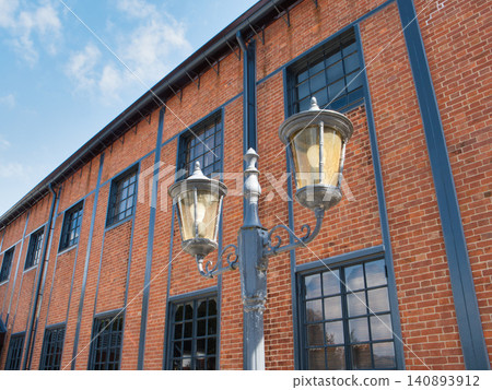 Red brick and streetlights Red brick and streetlights 140893912