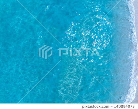 Aerial view of sea beach sand background Aerial view of sea beach sand background 140894072