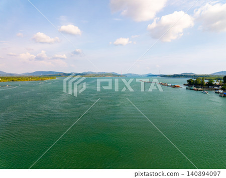 Aerial view of sea surface water texture background,sun reflections Aerial flying drone view Waves water surface texture in sunny day Aerial view of sea surface water texture background,sun reflections Aerial flying drone view Waves water surface texture in sunny day 140894097