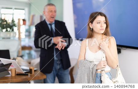 head of a successful company, got angry and scolds at a young employee for being late head of a successful company, got angry and scolds at a young employee for being late 140894768
