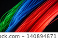 Ultra-thin strands composed of vibrant fibres, isolated against a deep black 140894871
