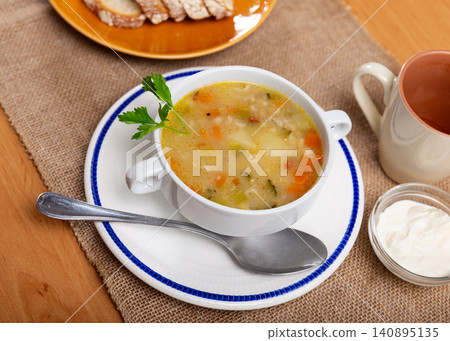 Rassolnik - Traditional Russian soup with pickled cucmbers Rassolnik - Traditional Russian soup with pickled cucmbers 140895135