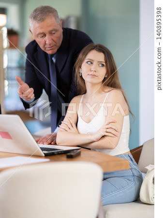 Boss scolding at office employee Boss scolding at office employee 140895398