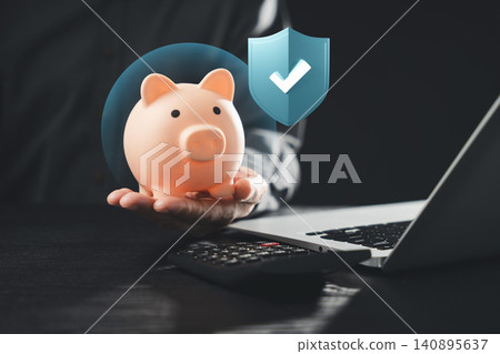 Insurance plan protect real estate assurance agent finance services represented by businessman holding piggy bank and shield icon, symbolizing secure savings, financial safety 140895637
