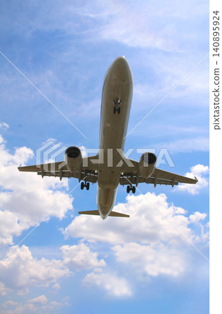 Looking up at a jet plane in landing approach. Looking up at a jet plane in landing approach. 140895924
