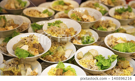 bowls of traditional mixed tofu served on a table, showcasing a delicious Asian-inspired dish with fresh ingredients and authentic presentation. This image is ideal for restaurant menus, food blogs bowls of traditional mixed tofu served on a table, showcasing a delicious Asian-inspired dish with fresh ingredients and authentic presentation. This image is ideal for restaurant menus, food blogs 140896216
