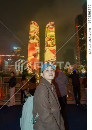 Happy woman traveler travel in Chengdu city. Famous Landmark for tourism attraction in Sichuan, China 140896262